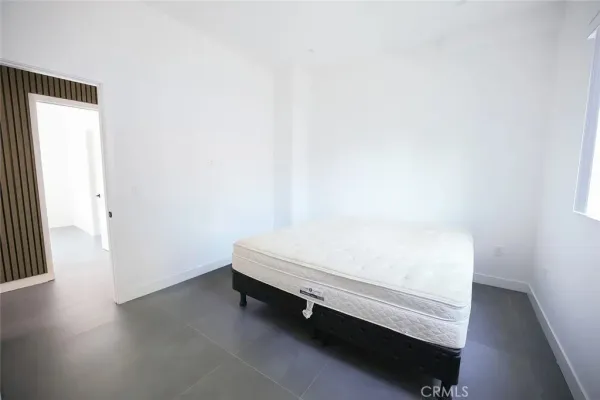 a kitchen with stainless steel appliances a stove a sink and a refrigerator