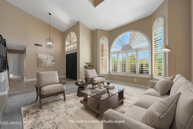 a view of livingroom with furniture and windows