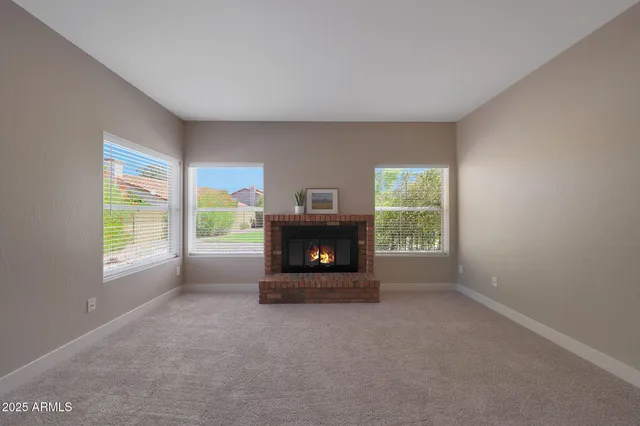 a bathroom with a double vanity sink and a window