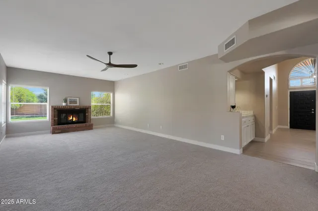 a kitchen with sink cabinets and wooden floor