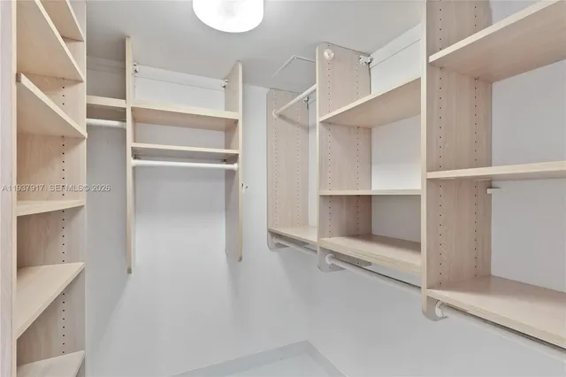 a view of an empty walk in closet