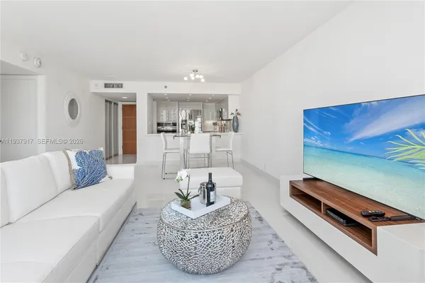 a living room with furniture and a couch