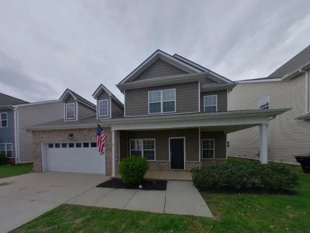 front view of house with a yard