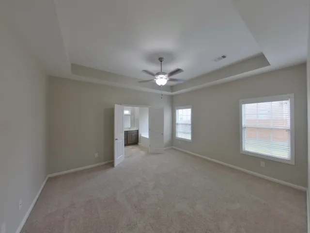 a view of a livingroom and window
