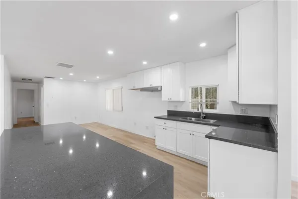 a view of a hallway with closet