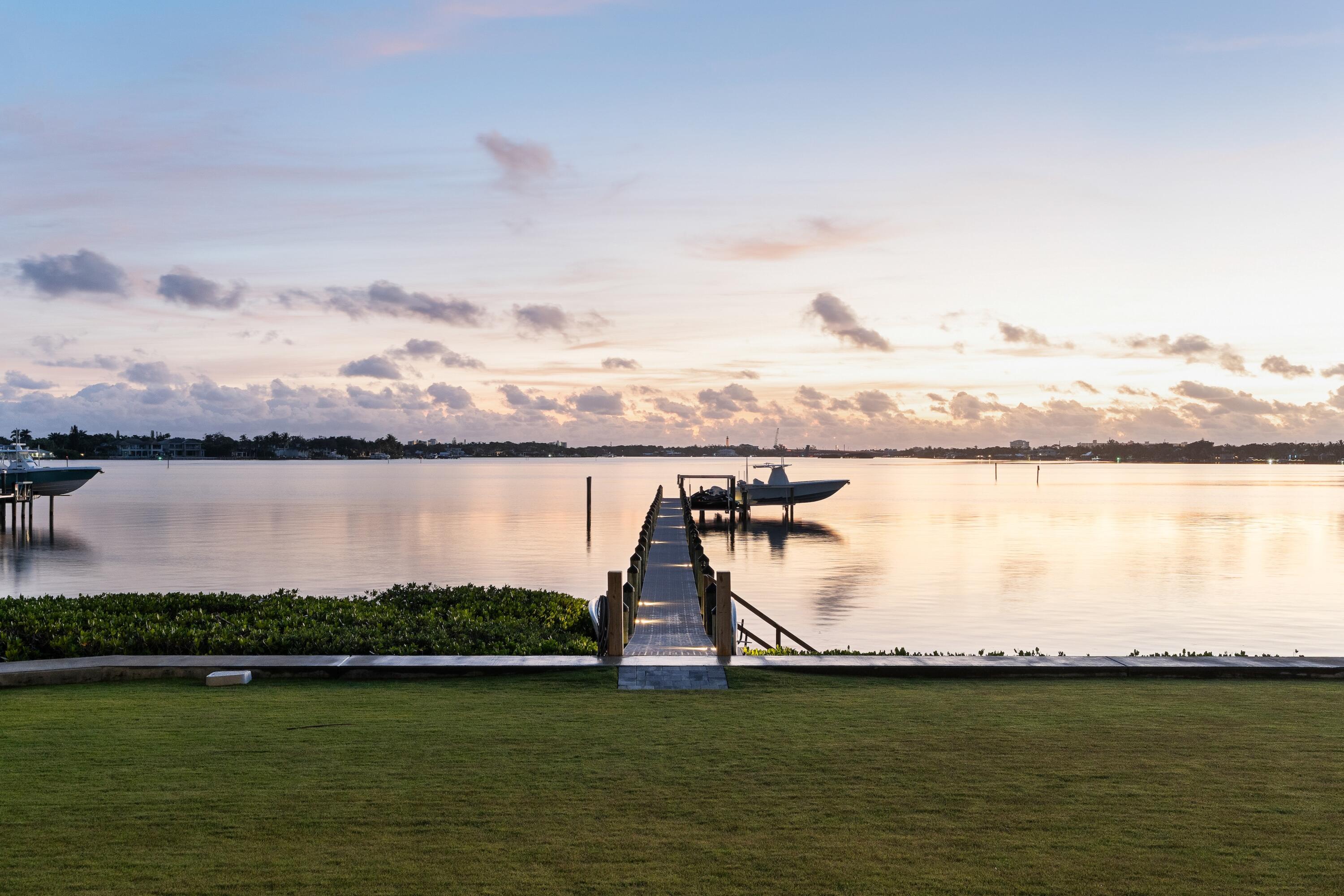 5211 Pennock Point Road Jupiter, FL 33458 - Photo 34 of 69 a view of a water and a mountain in the background