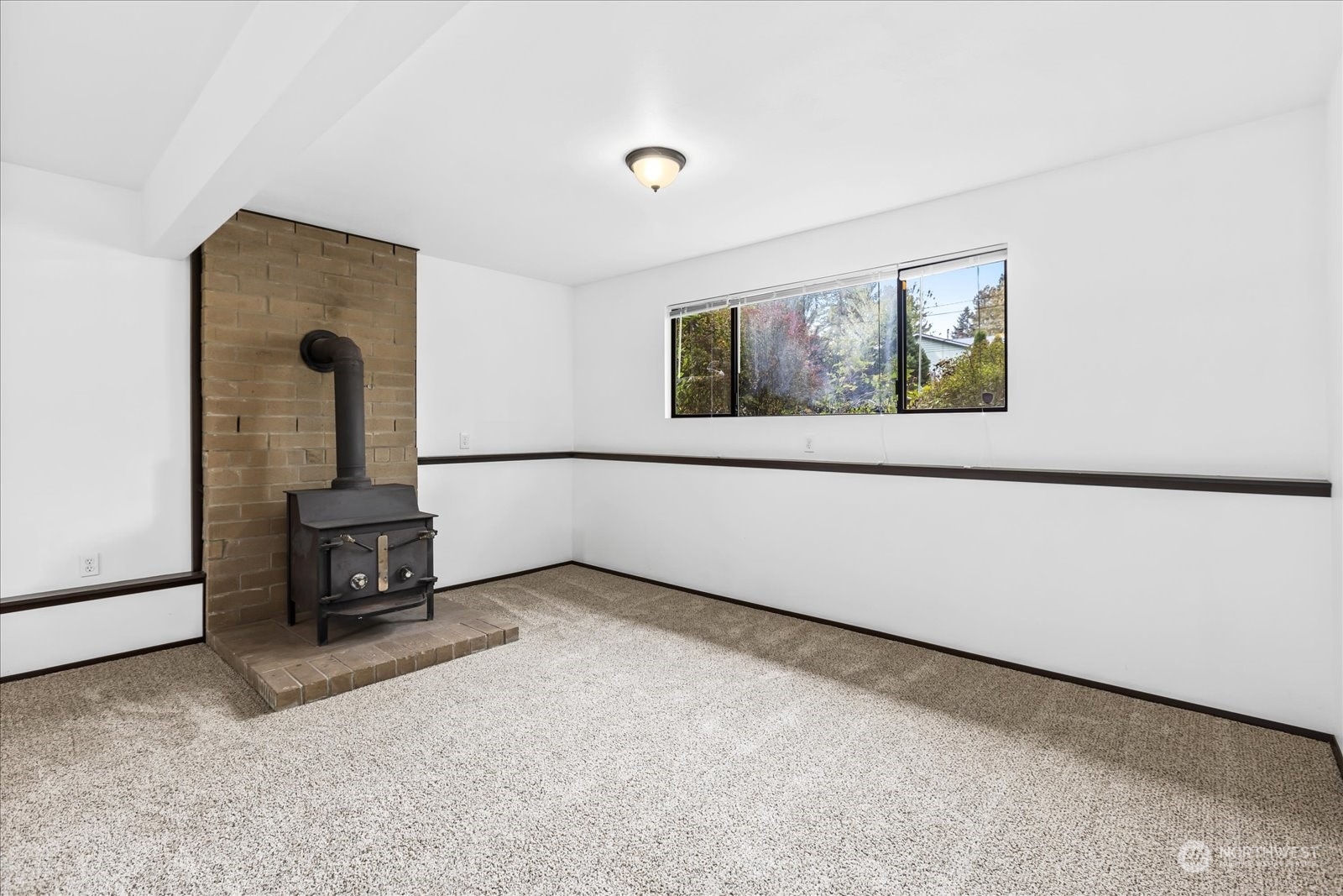 7023 Lower Ridge Road Everett, WA 98203 - Photo 26 of 38 a view of a livingroom with furniture and a window