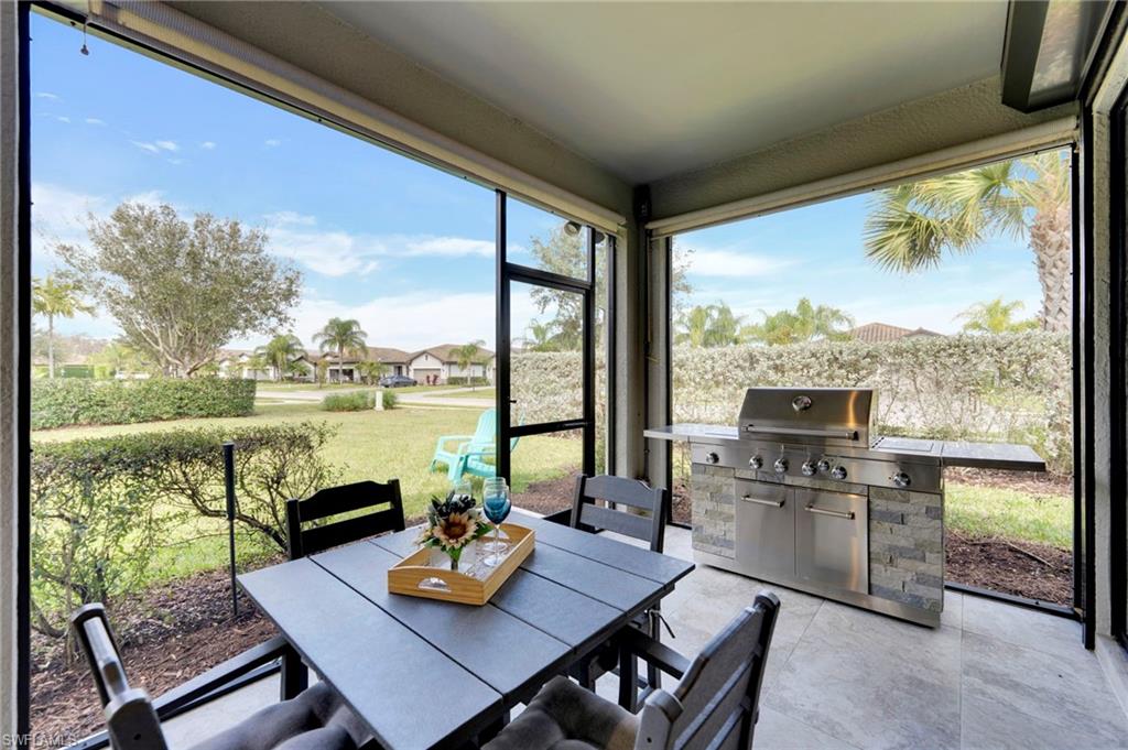 19802 Bittersweet Lane Estero, FL 33928 - Photo 15 of 50 a view of a dining room with furniture window and outside view
