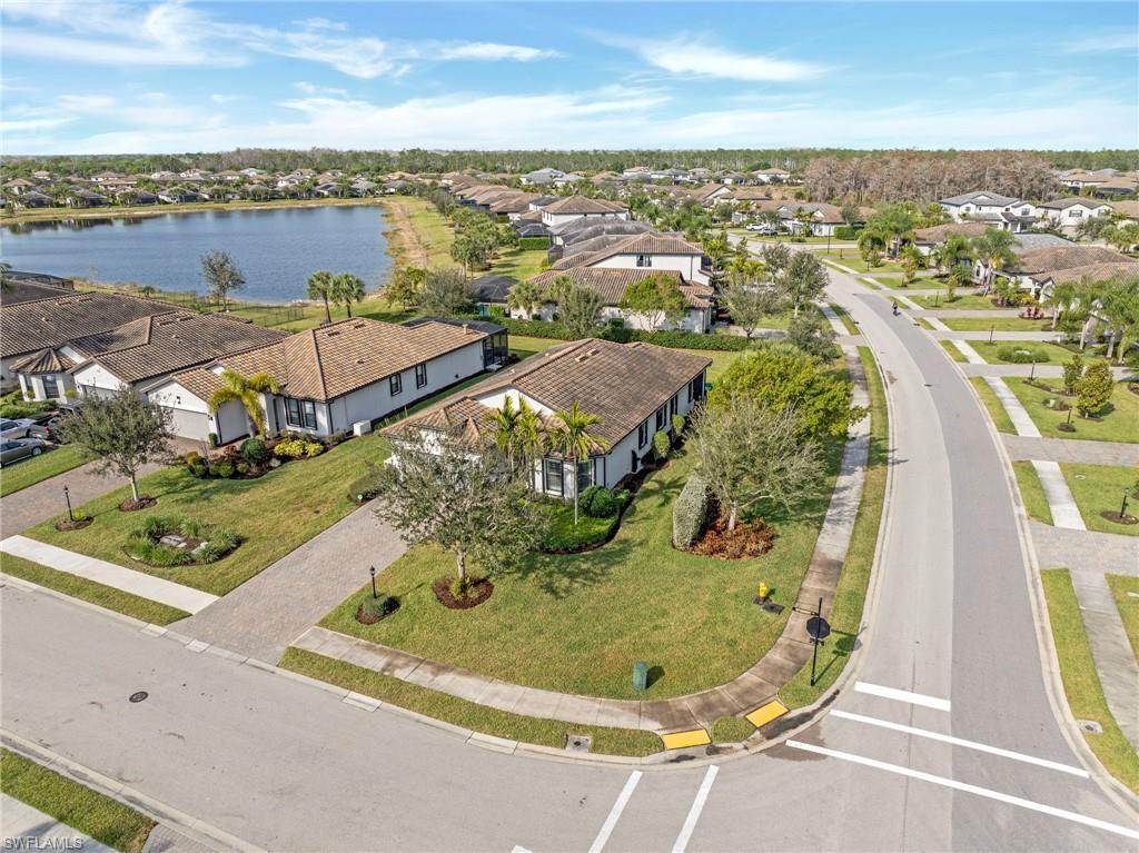19802 Bittersweet Lane Estero, FL 33928 - Photo 38 of 50 an aerial view of residential houses with outdoor space