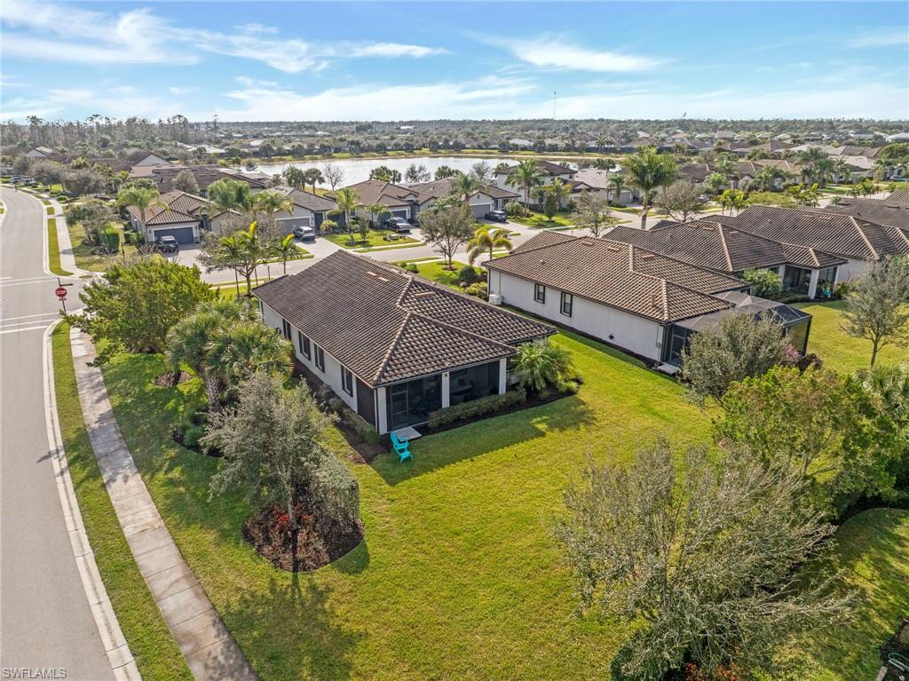 19802 Bittersweet Lane Estero, FL 33928 - Photo 39 of 50 an aerial view of residential houses with outdoor space