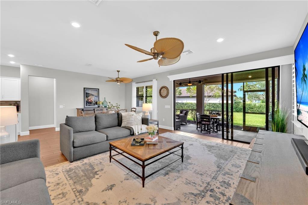 19802 Bittersweet Lane Estero, FL 33928 - Photo 4 of 50 a living room with furniture and a large window