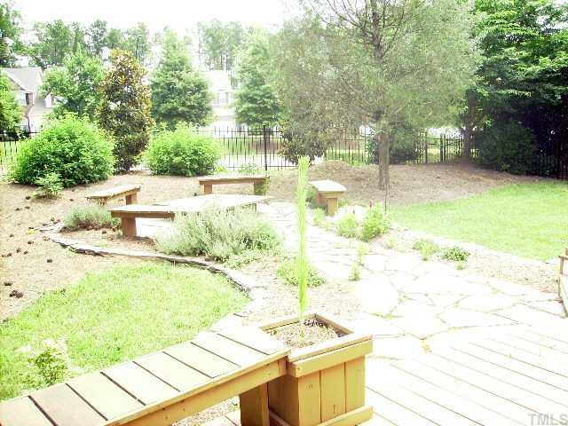12240 Beestone Lane Raleigh, NC 27614 - Photo 11 of 12 a view of a yard with an outdoor space