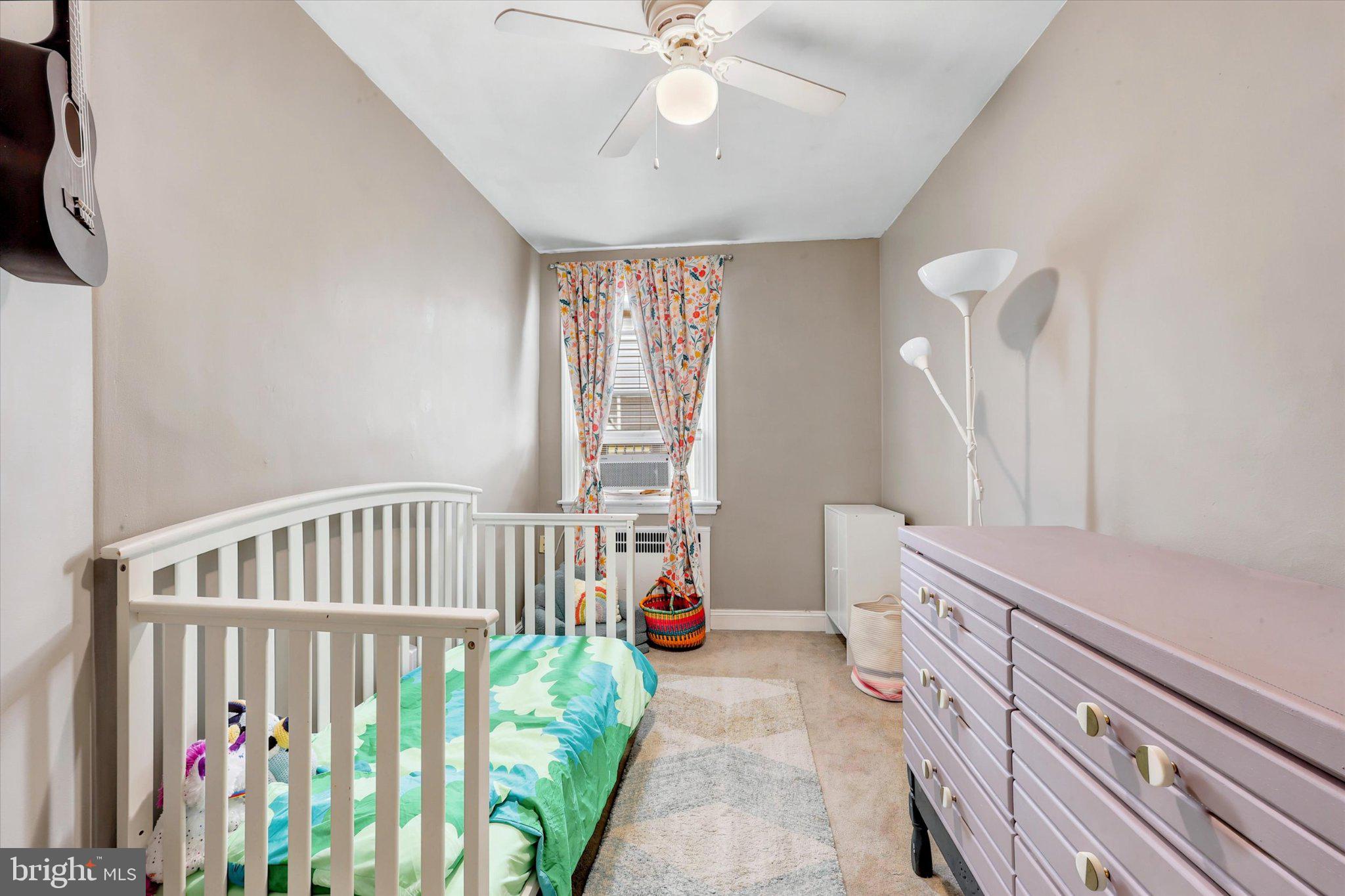115 Academy Lane Upper Darby, PA 19082 - Photo 15 of 25 a bedroom with furniture and a window