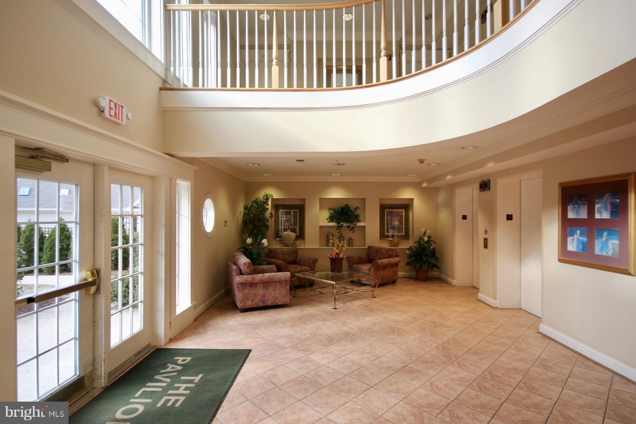 7000 Falls Reach Drive, Unit 110 Falls Church, VA 22043 - Photo 18 of 26 a view of livingroom with furniture
