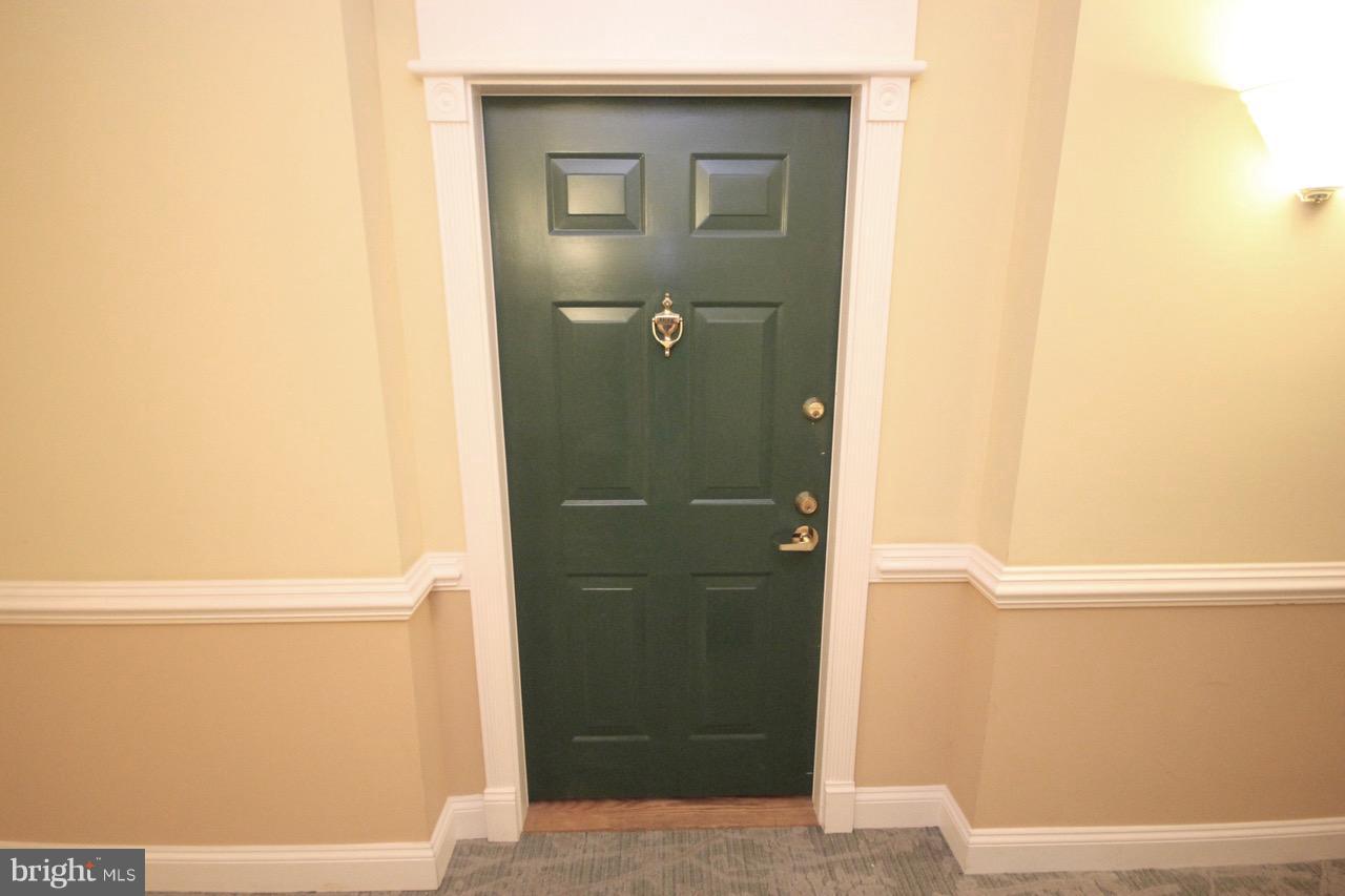 7000 Falls Reach Drive, Unit 110 Falls Church, VA 22043 - Photo 22 of 26 a bathroom with a shower