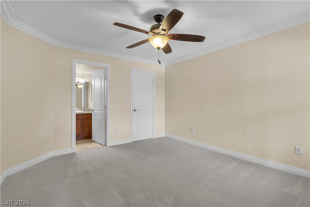 8101 West Flamingo Road, Unit 2001 Las Vegas, NV 89147 - Photo 8 of 28 Well-lit sleeping quarters feature crown molding, soft carpeting, and a ceiling fan for year-round comfort.