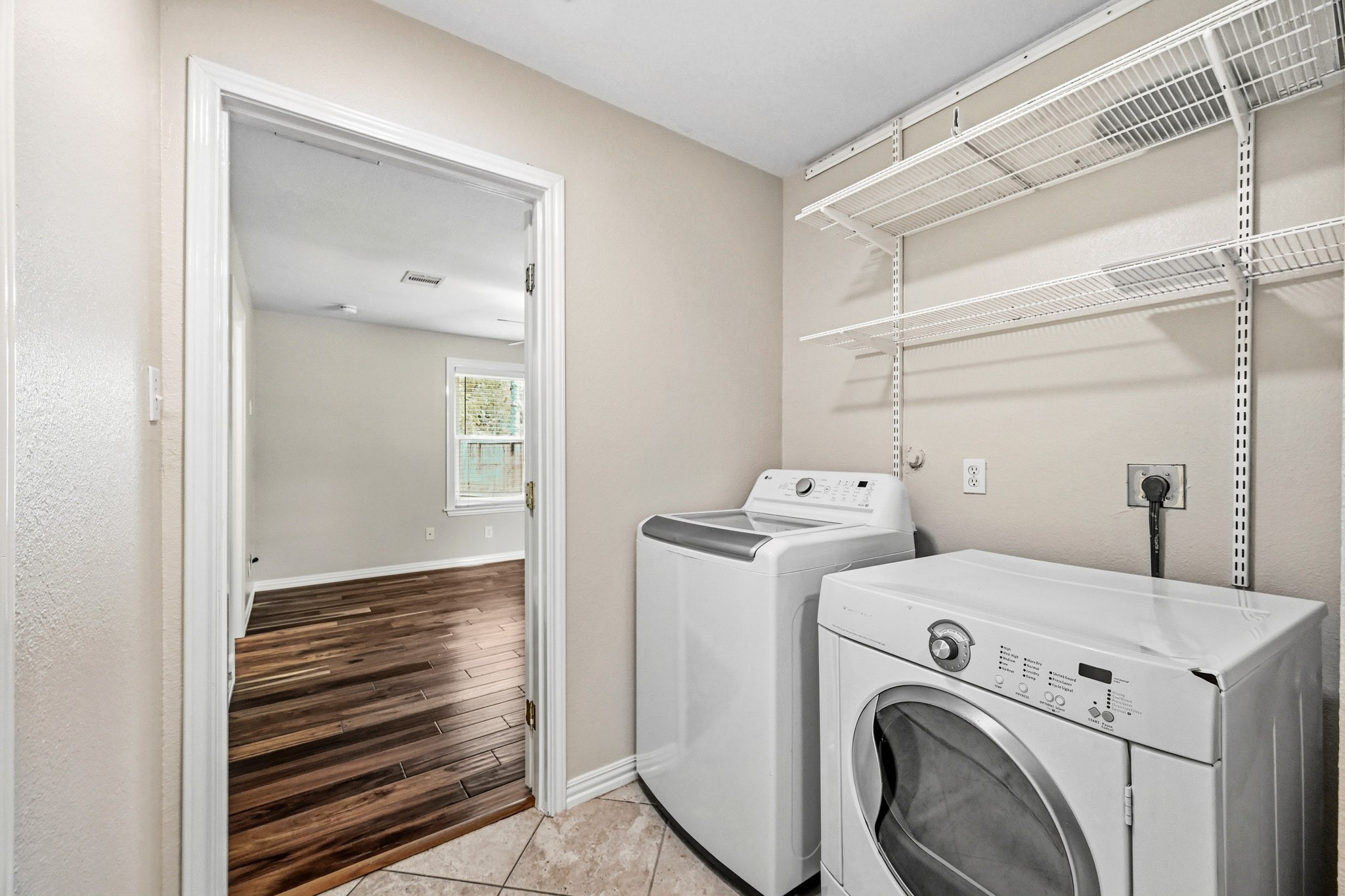 3602 Sweet Gum Spring, TX 77388 - Photo 23 of 30 a view of storage and utility room with washer and dryer