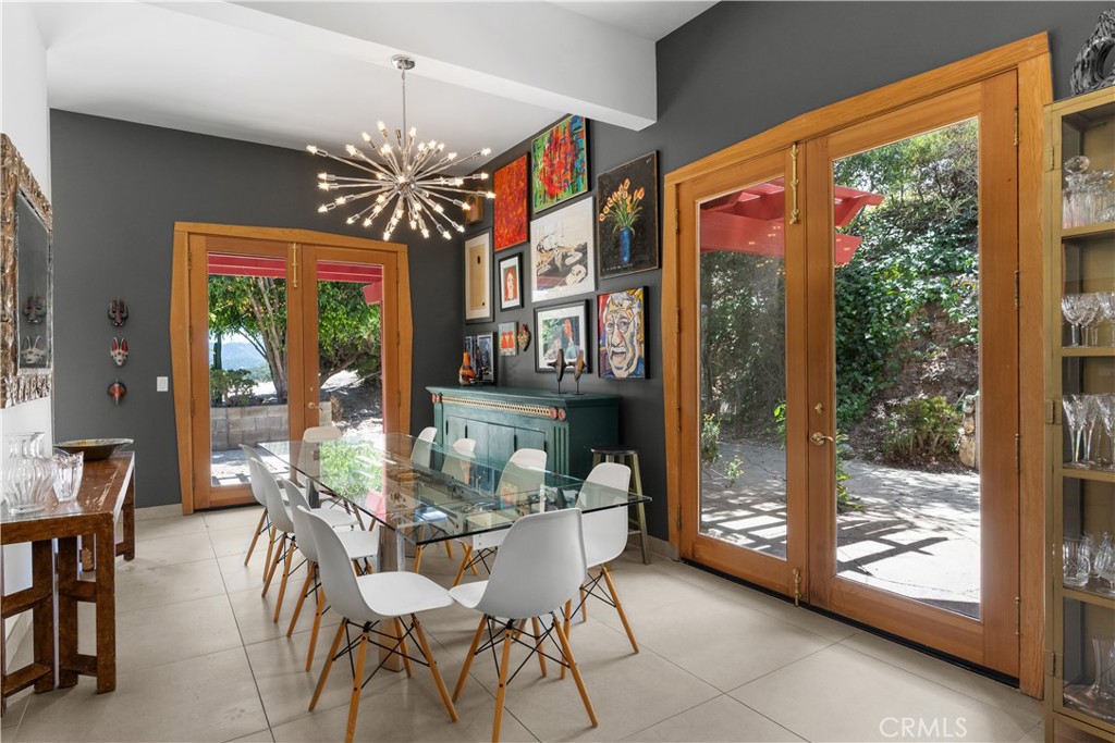 1012 Upper Los Berros Road Nipomo, CA 93444 - Photo 14 of 75 a dining room with furniture large windows and outdoor view