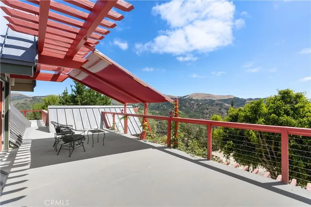 a view of a house with a mountain