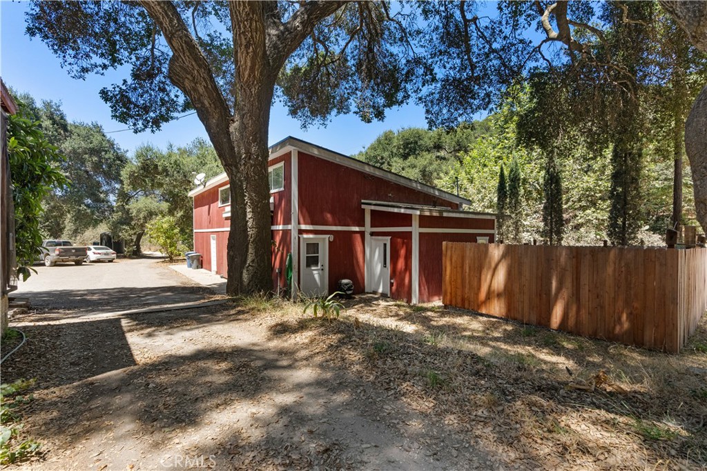 1012 Upper Los Berros Road Nipomo, CA 93444 - Photo 67 of 75 a view of a barn in the middle of a yard