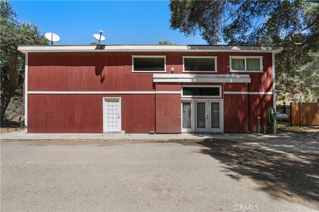 1012 Upper Los Berros Road Nipomo, CA 93444 - Photo 68 of 75 a front view of a house with a garage