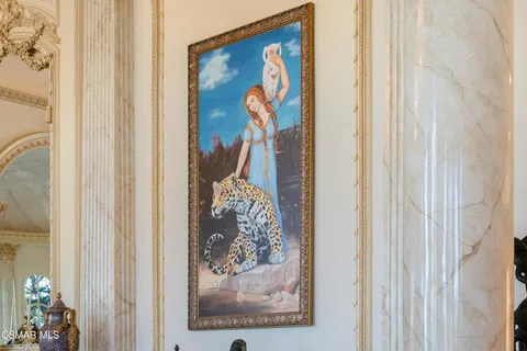 a view of a dining room with furniture and window