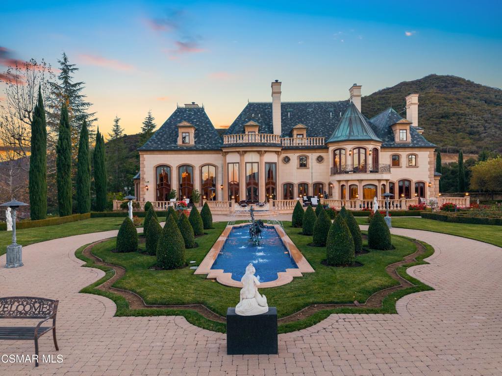 900 West Stafford Road Thousand Oaks, CA 91361 - Photo 72 of 79 a front view of a house with yard and green space