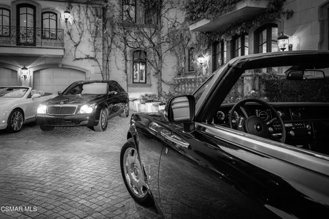 a view of a lake with a house in the background