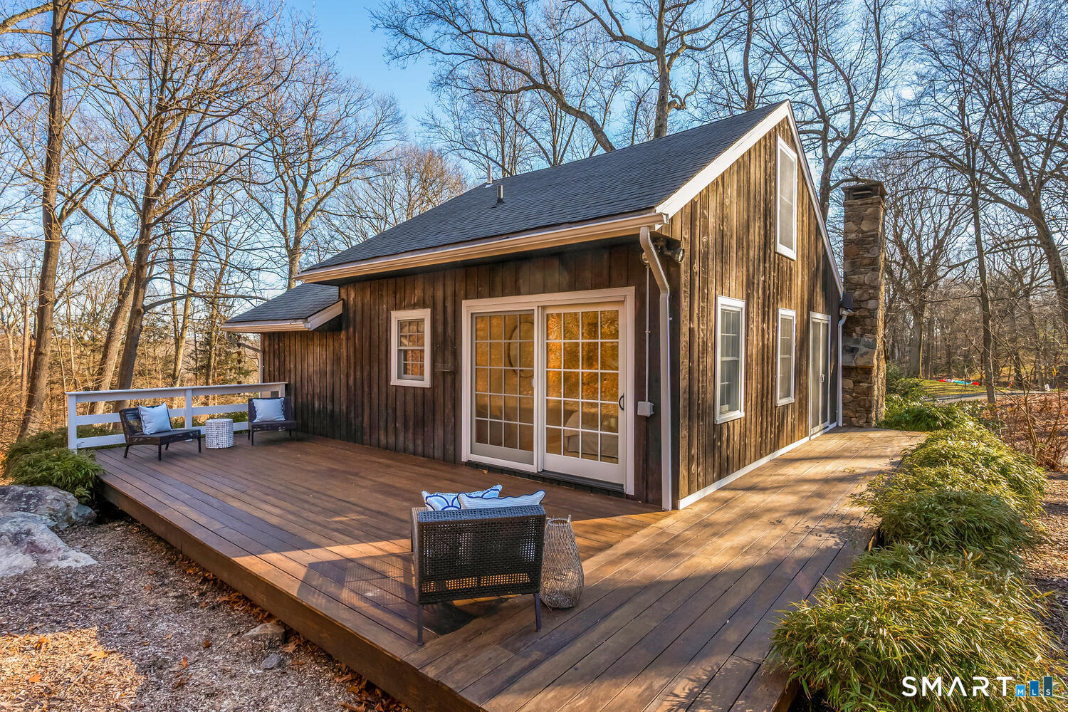 124 Wolfpit Road Wilton, CT 06897 - Photo 23 of 27 Wraparound deck with access from primary bedroom