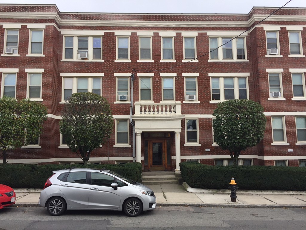 24 Ransom Road, Unit 2 Boston, MA 02135 - Photo 1 of 6 a car parked in front of a building