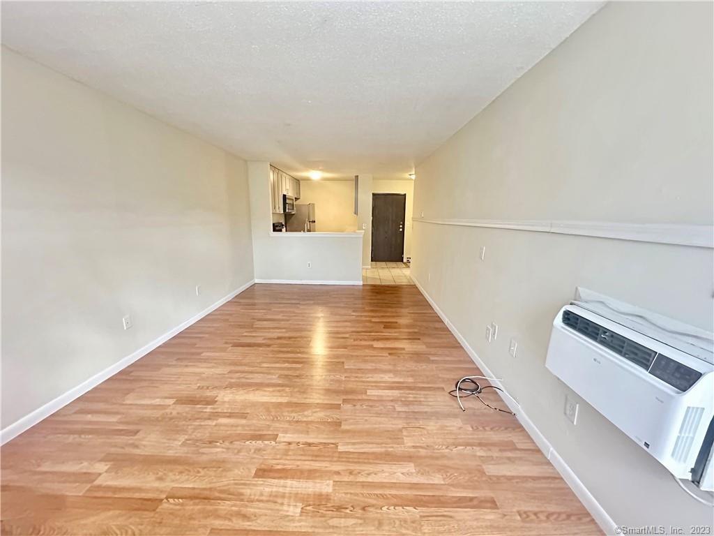 3699 Broadbridge Avenue, Unit 132 Stratford, CT 06614 - Photo 5 of 17 Living room with hardwood floors