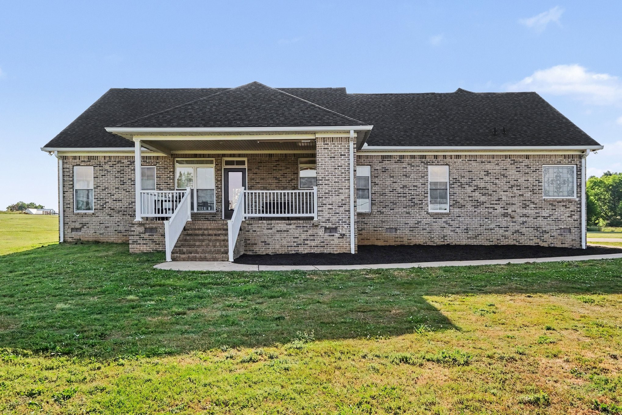 2829 Anes Station Road Lewisburg, TN 37091 - Photo 36 of 43 a view of a house with a yard