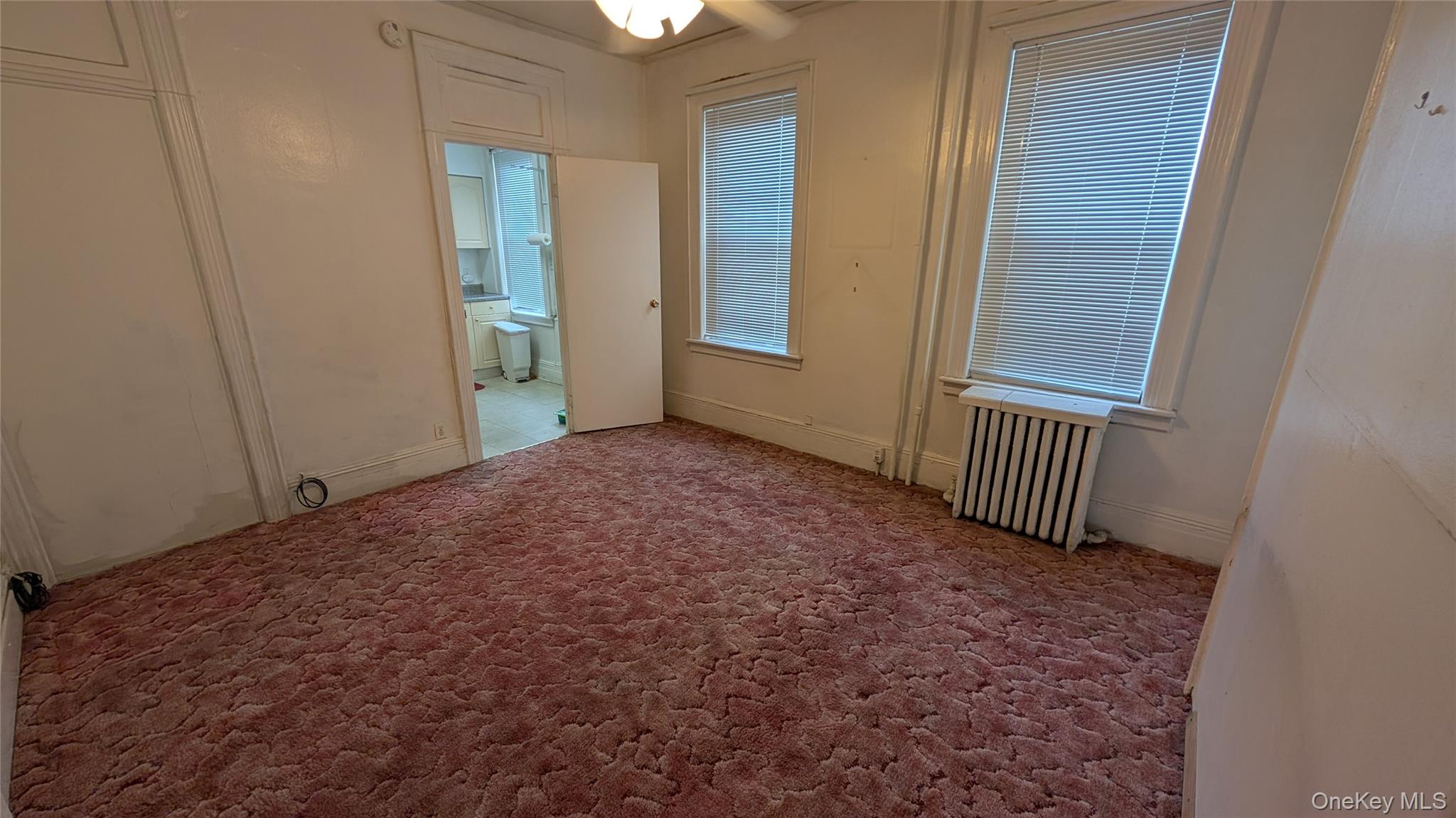 44-66 23rd Street Queens, NY 11101 - Photo 9 of 26 an empty room with windows