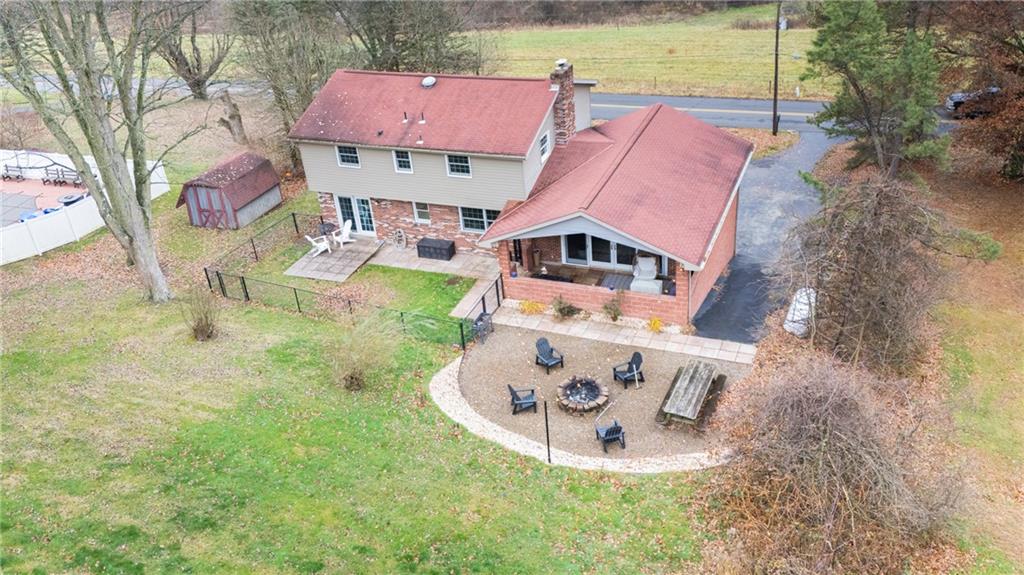170 Eisaman Road Irwin, PA 15642 - Photo 38 of 41 Covered patio; firepit; & fenced area