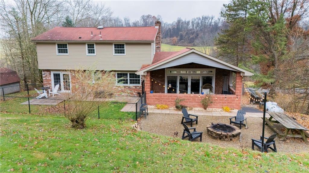 170 Eisaman Road Irwin, PA 15642 - Photo 39 of 41 Covered patio; firepit; & fenced area
