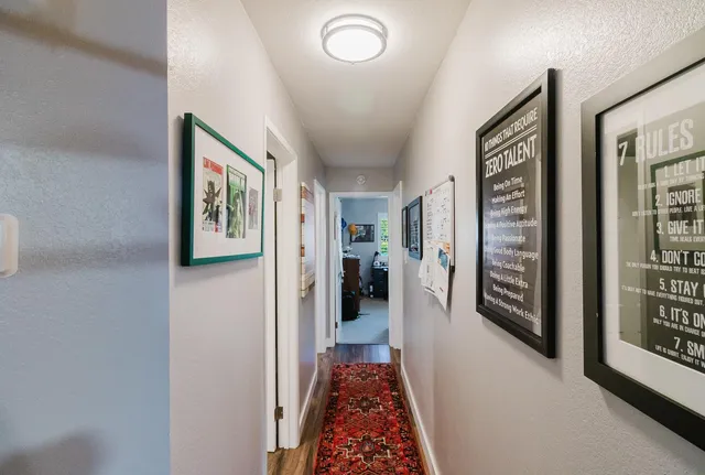 a bathroom with a sink double vanity and a mirror