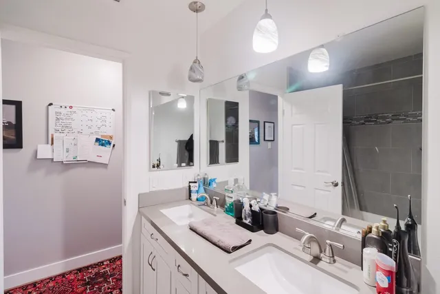 a bedroom with bed and a window