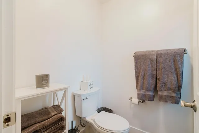 a kitchen with stainless steel appliances granite countertop a sink and stove