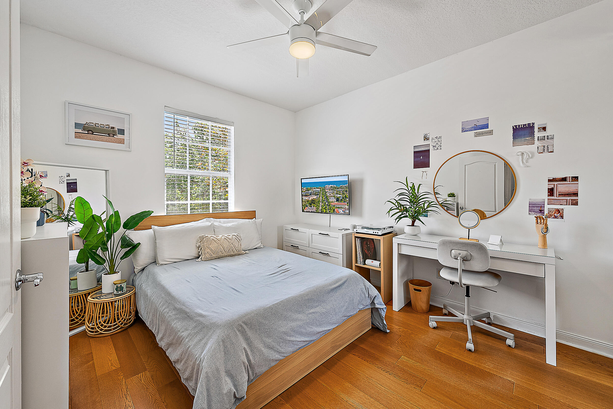 107 Rivinia Drive Jupiter, FL 33458 - Photo 10 of 28 a bedroom with a bed furniture and a window