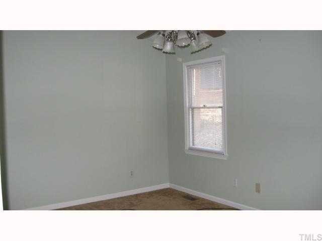 4225 Bluewing Road Raleigh, NC 27616 - Photo 7 of 8 a open area with window