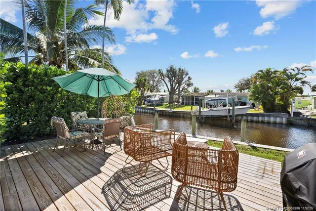 a view of a lake with sitting area