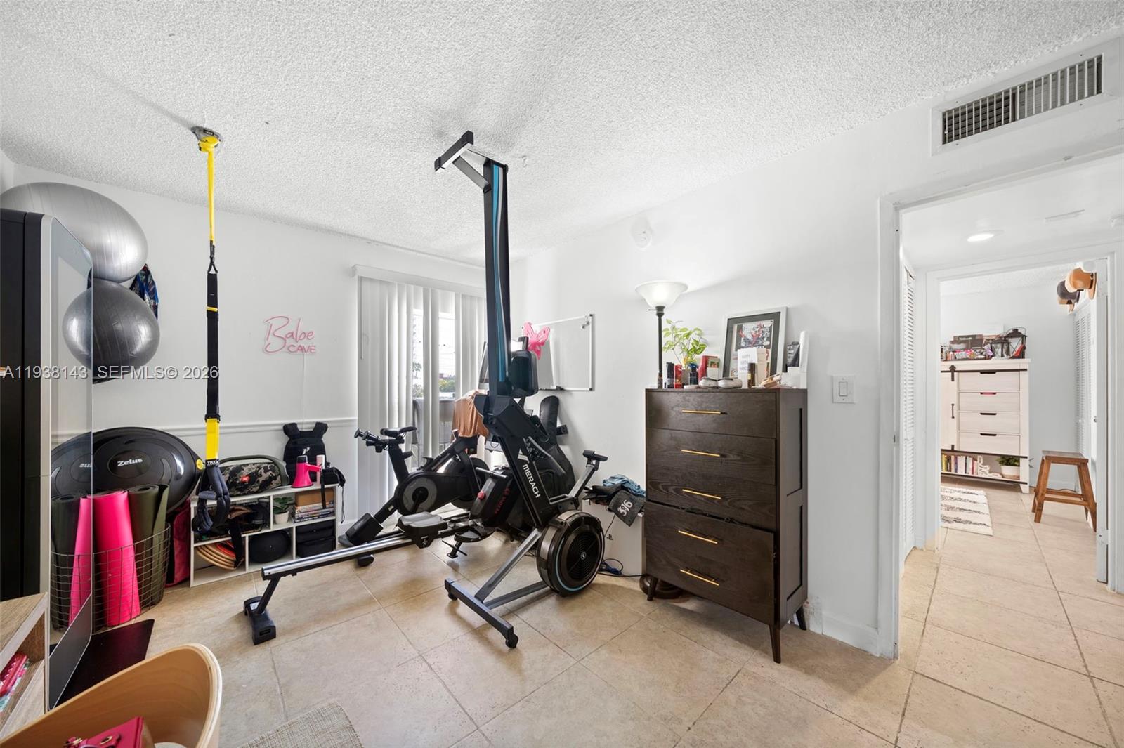 2150 Southwest 16th Avenue, Unit 402 Miami, FL 33145 - Photo 13 of 25 a view of a room with gym equipment