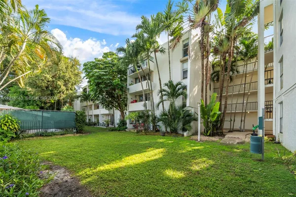 a view of a backyard with a garden