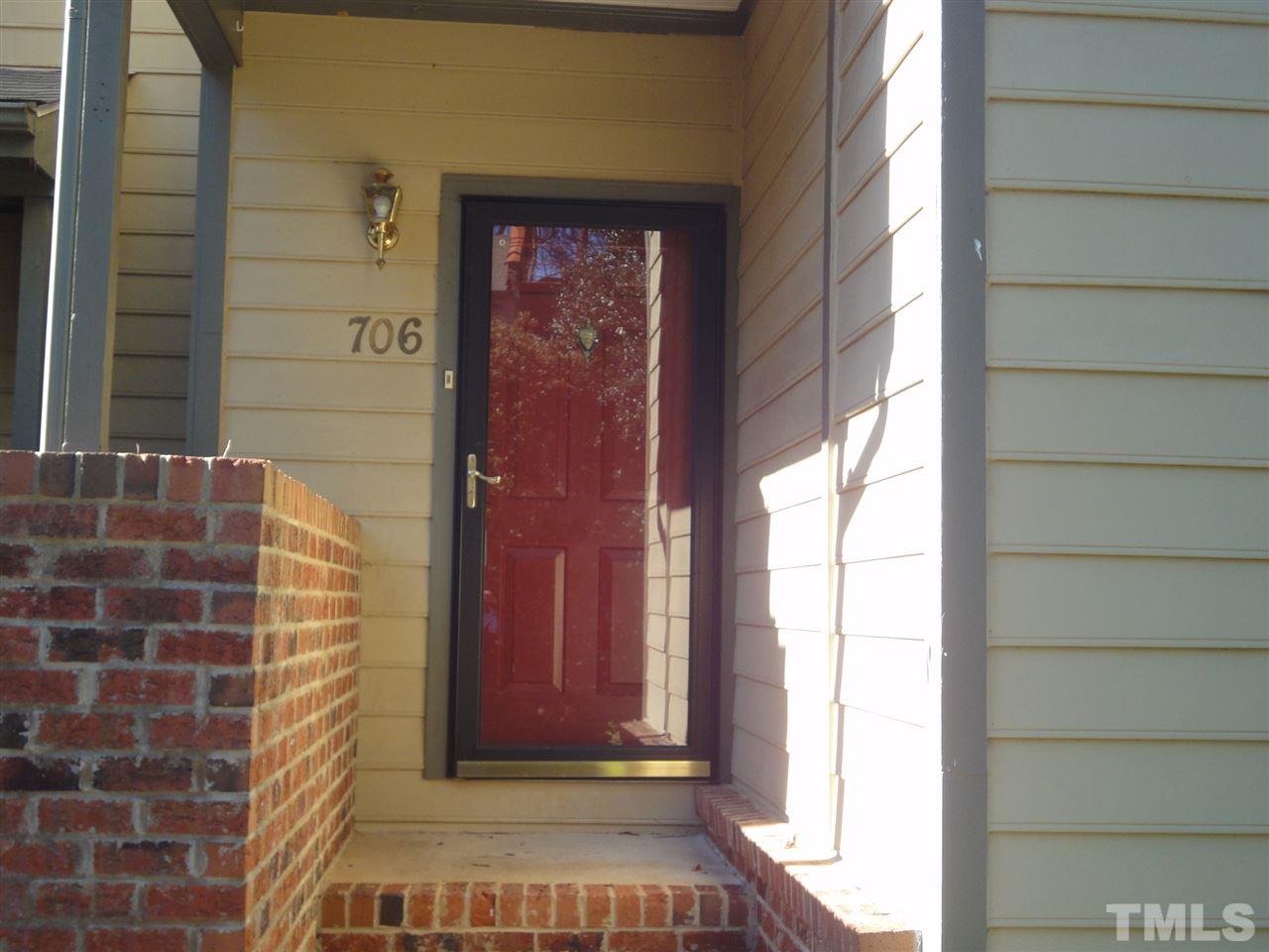 706 Broad Leaf Circle, Unit 706 Raleigh, NC 27613 - Photo 1 of 17 Door opens to entry foyer then steps up to the main level living.