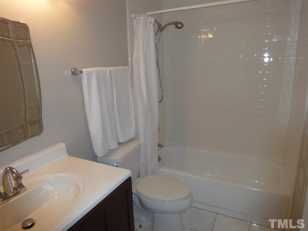 706 Broad Leaf Circle, Unit 706 Raleigh, NC 27613 - Photo 14 of 17 Updated and w tile floor.