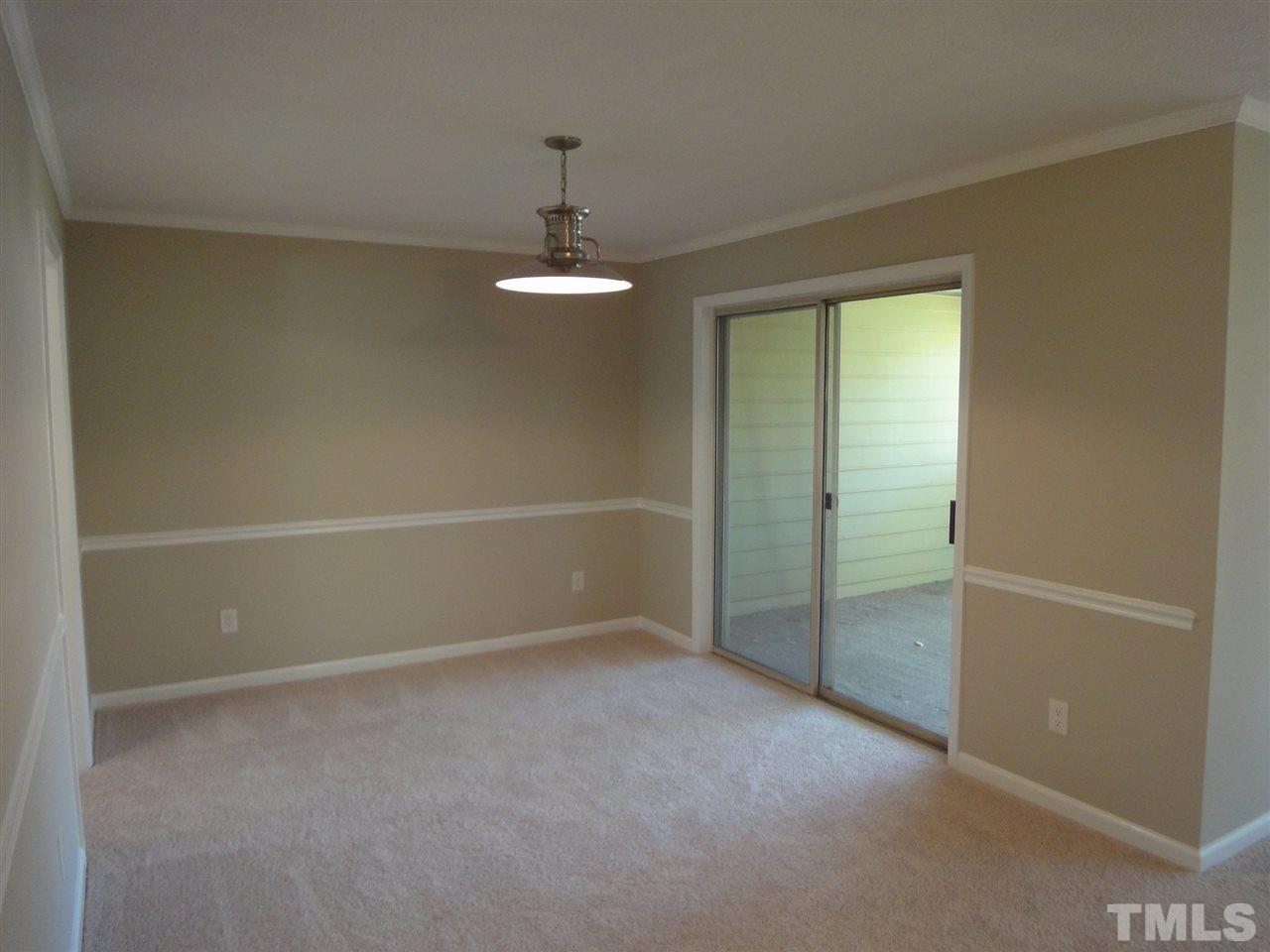 706 Broad Leaf Circle, Unit 706 Raleigh, NC 27613 - Photo 7 of 17 Full sized dining room just off kitchen or can be used as a studio or flex space.
