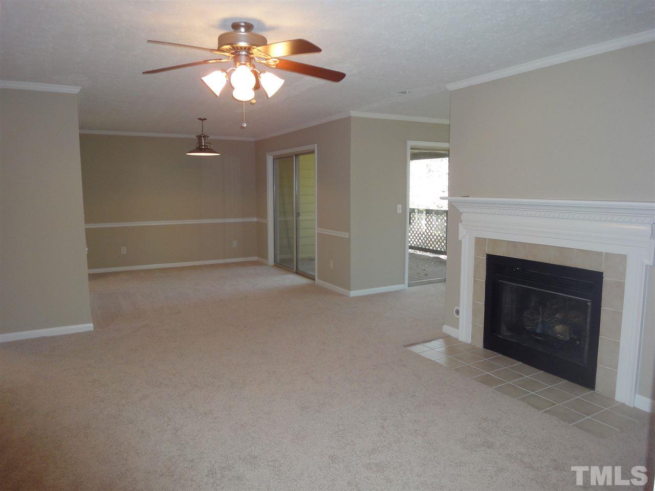 706 Broad Leaf Circle, Unit 706 Raleigh, NC 27613 - Photo 8 of 17 Living area w the gas log fireplace.
