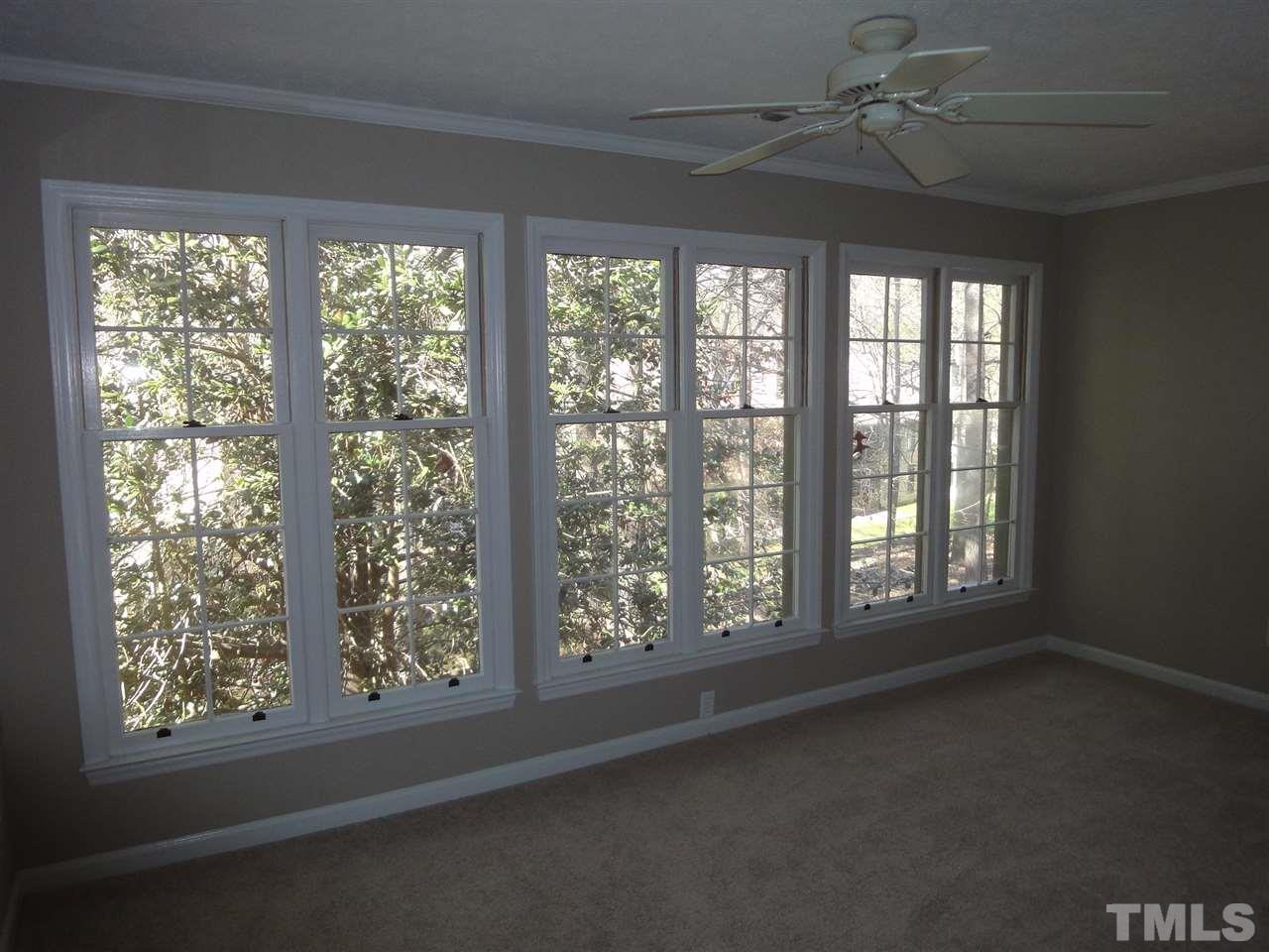 706 Broad Leaf Circle, Unit 706 Raleigh, NC 27613 - Photo 9 of 17 Nice sun room featuring wall of windows. Nice place to relax and contemplate.