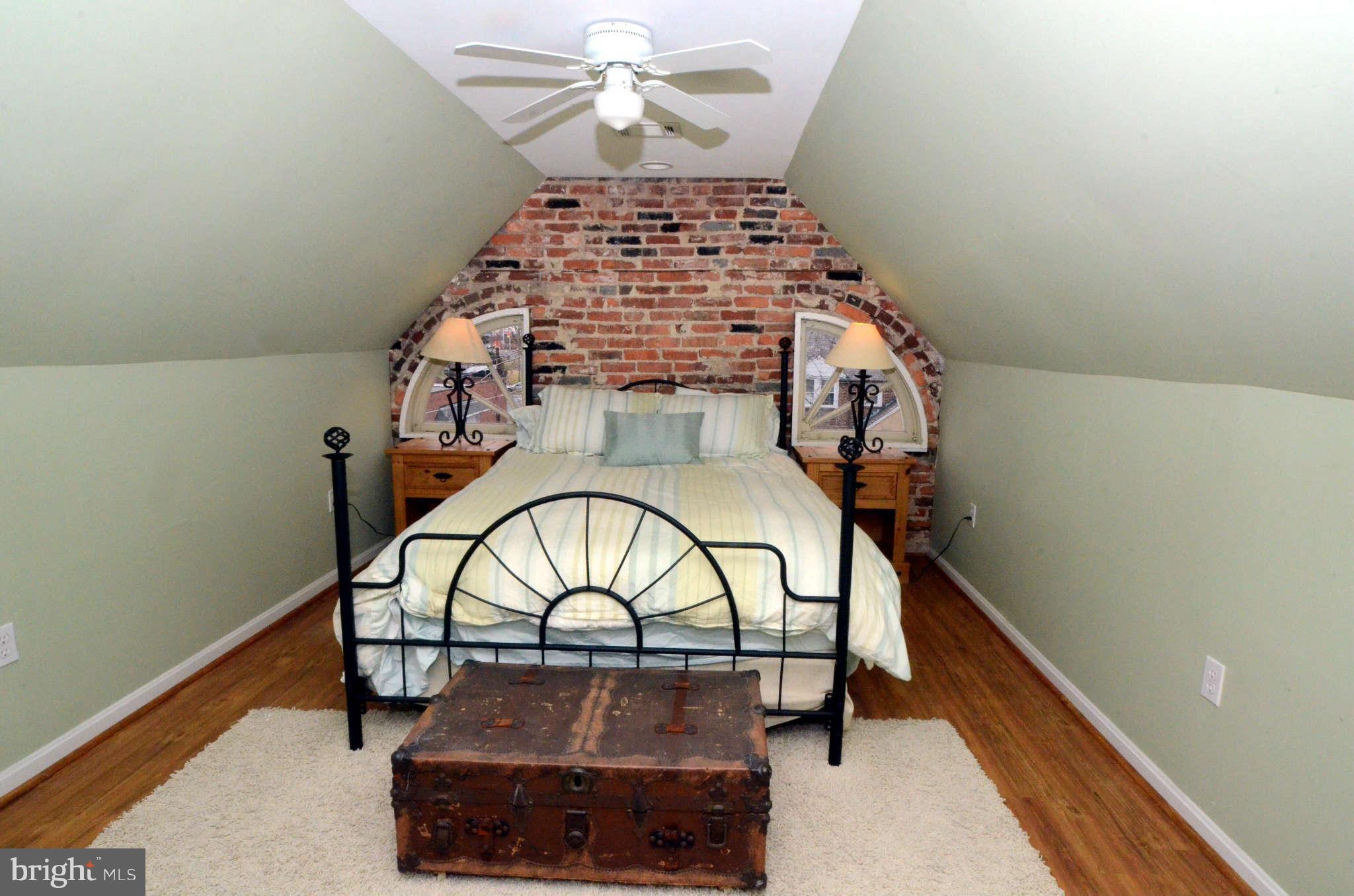426 Hopkins Road Baltimore, MD 21212 - Photo 14 of 30 a view of fireplace with wooden floor