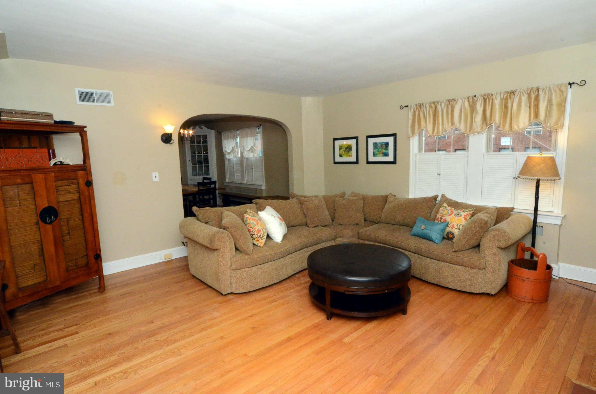 426 Hopkins Road Baltimore, MD 21212 - Photo 4 of 30 a living room with furniture and a wooden floor